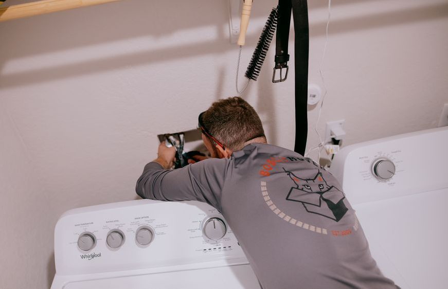 Man Removing Washingmashine