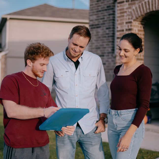 People Checking Papers